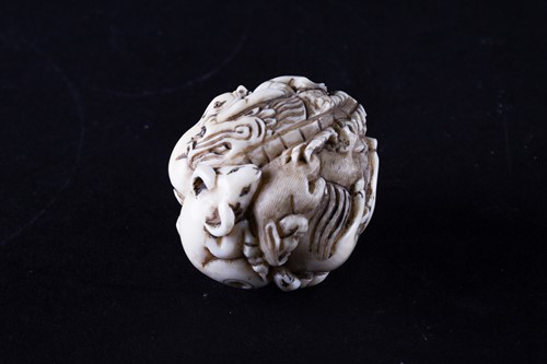 Lot 141 - A Japanese ivory zodiac ball netsuke, late...