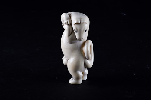 Lot 187 - A Japanese carved ivory okimono of a dancing...