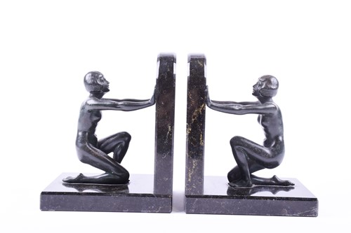 Lot 308 - A pair of Art Deco style patinated spelter...