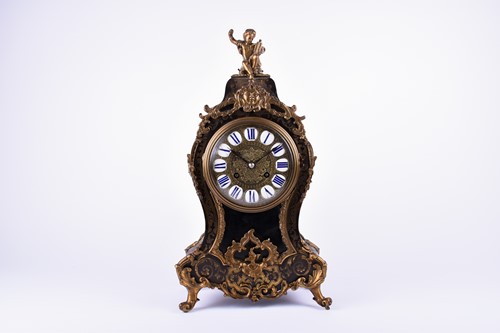 Lot 385 - A Louis XV style French mantel clock, in an...