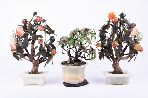 Lot 125 - A pair of Chinese carved and polished stone...