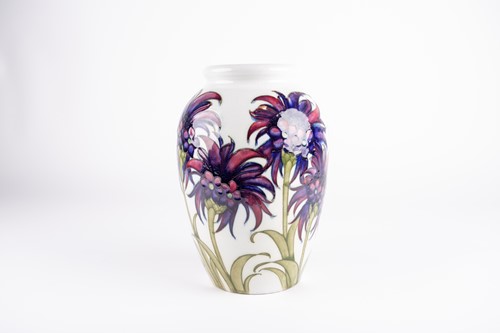 Lot 49 - A William Moorcroft 'Cornflower' pattern vase,...