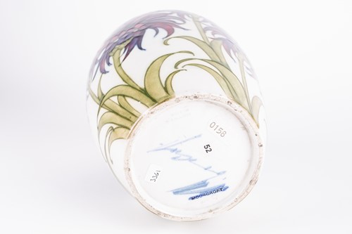 Lot 49 - A William Moorcroft 'Cornflower' pattern vase,...