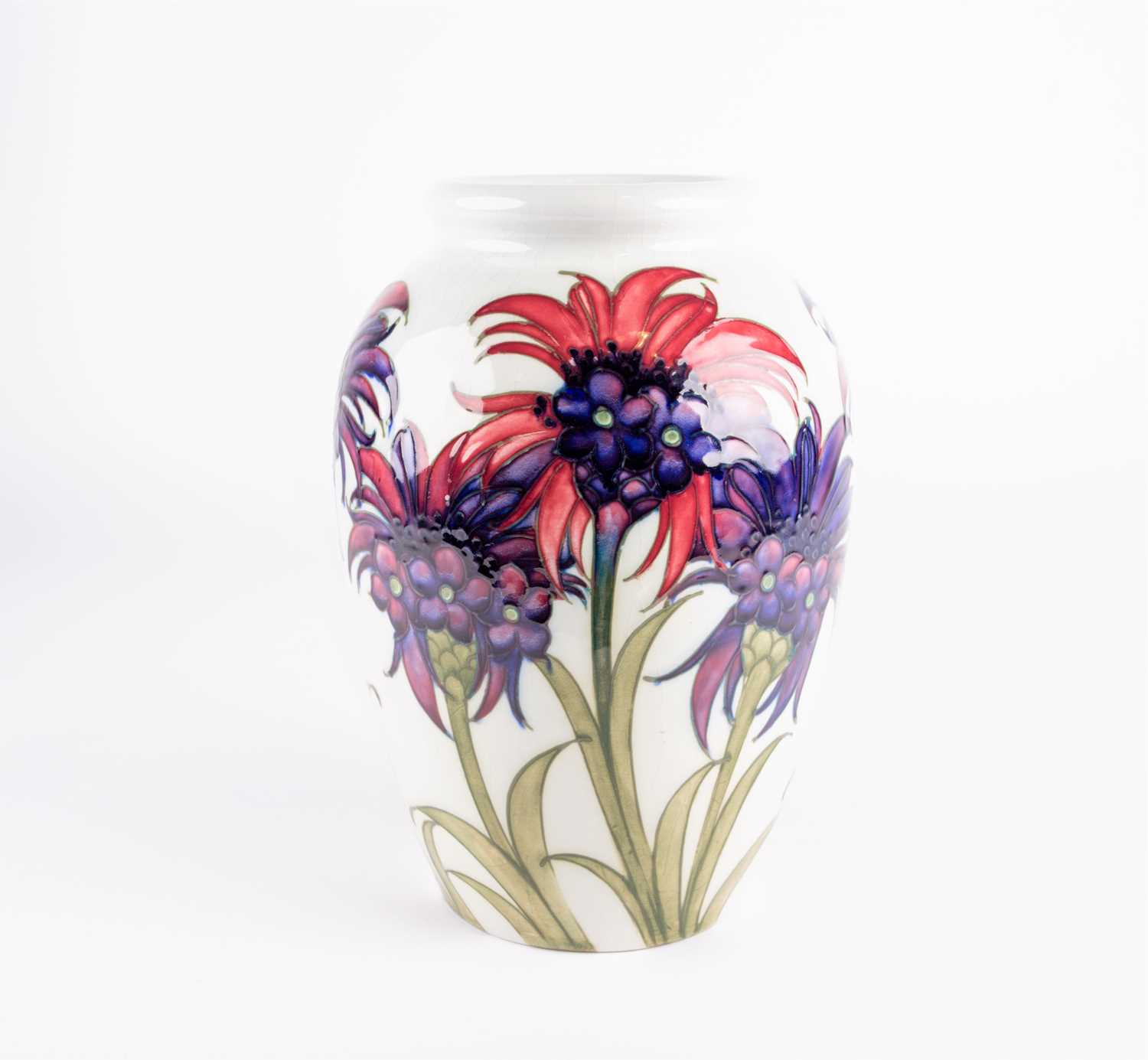 Lot 49 - A William Moorcroft 'Cornflower' pattern vase,...