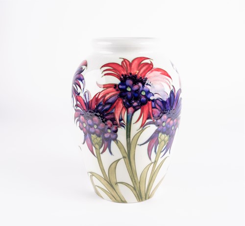 Lot 49 - A William Moorcroft 'Cornflower' pattern vase,...