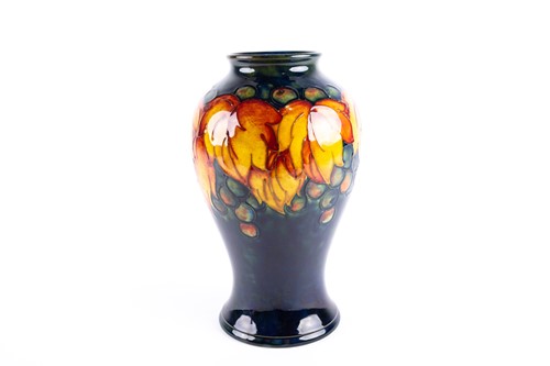 Lot 41 - A William Moorcroft flambé 'Leaf & Berry' vase,...