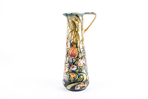 Lot 32 - A Moorcroft 'Prairie' pattern ewer, designed...