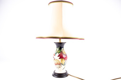 Lot 27 - A Moorcroft 'Anna Lily' pattern table lamp,...