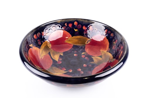 Lot 301 - A large William Moorcroft 'Pomegranate' bowl,...