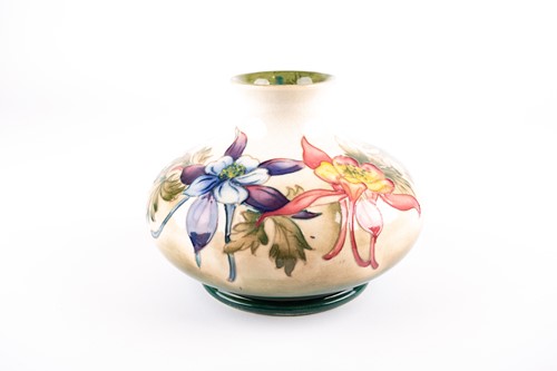 Lot 16 - A Walter Moorcroft 'Columbine' pattern vase,...