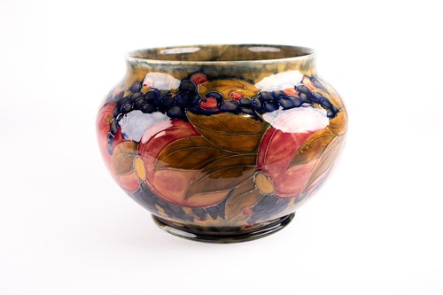 Lot 26 - A William Moorcroft 'Pomegranate' pattern...
