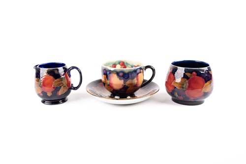 Lot 269 - A William Moorcroft 'Pomegranate' pattern tea...