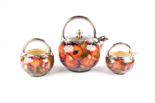 Lot 58 - A rare William Moorcroft silver overlaid...