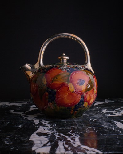 Lot 58 - A rare William Moorcroft silver overlaid...