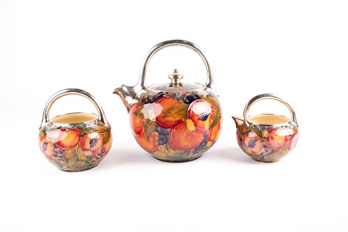 Lot 58 - A rare William Moorcroft silver overlaid...