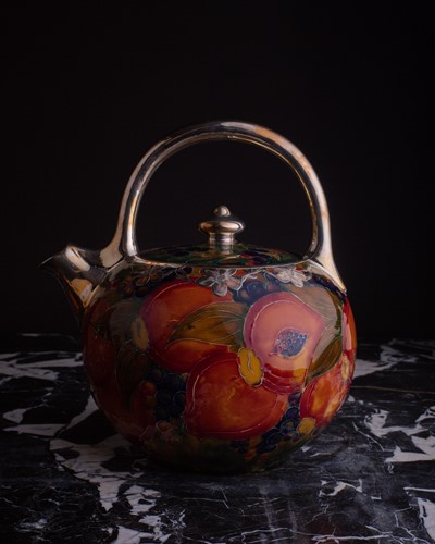 Lot 58 - A rare William Moorcroft silver overlaid...