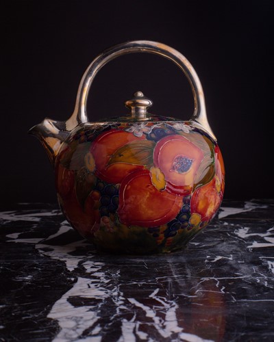 Lot 58 - A rare William Moorcroft silver overlaid...