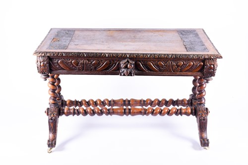 Lot 169 - A Victorian carved oak library table, the...
