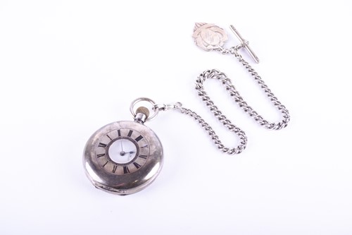 Lot 413 - A Continental silver cased half hunter pocket...