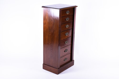 Lot 142 - An Edwardian beech Wellington chest,...