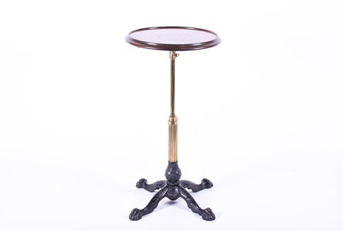 Lot 173 - A Victorian telescopic table, the mahogany top...