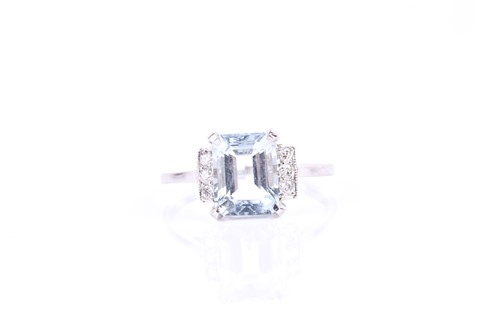 Lot 567 - A platinum, diamond, and aquamarine ring, set...