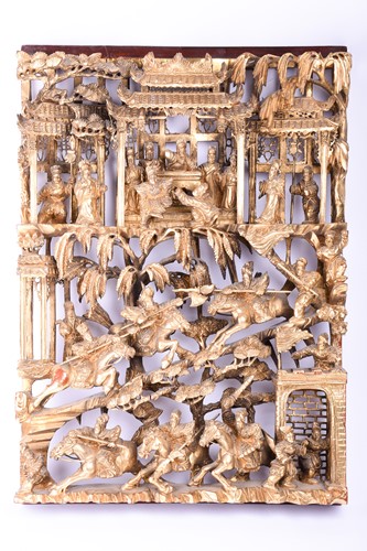 Lot 254 - A Chinese Chaozhou style carved and gilded...