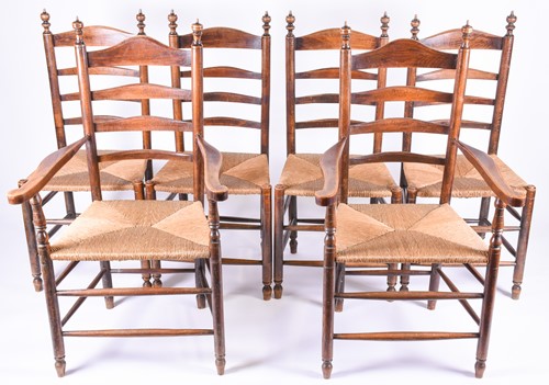 Lot 132 - A set of six early 20th century ladderback and...