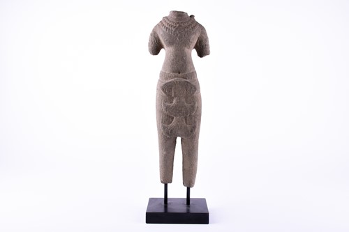 Lot 242 - A Cambodian or Thai carved stone female figure,...