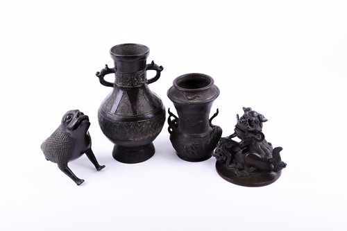 Lot 201 - A collection of Chinese bronzes, comprising an...