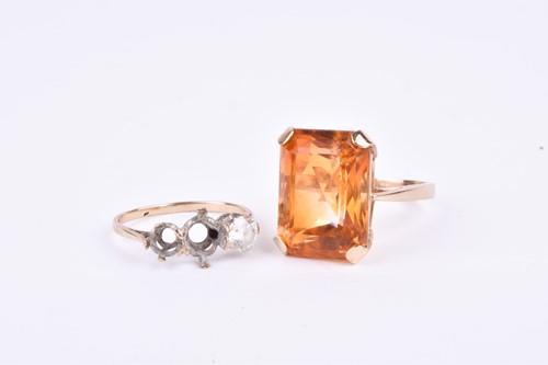 Lot 61 - A 9ct yellow gold and citrine dress ring, set...
