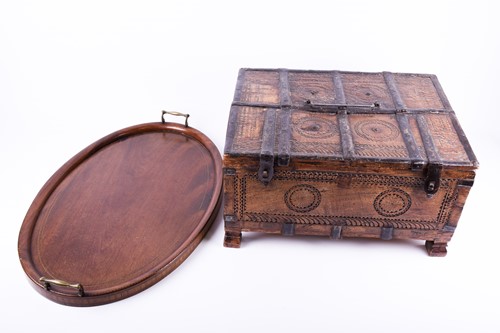 Lot 143 - An Indian dowry chest, with chip carved...