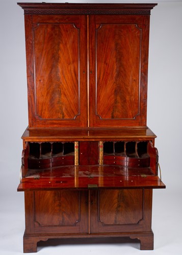 Lot 140 - A George III mahogany secretaire bookcase, the...