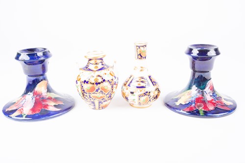 Lot 293 - A pair of Moorcroft tubelined dwarf...