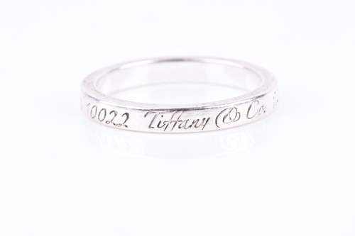 Lot 823 - Tiffany & Co. A silver ring, engraved '727...