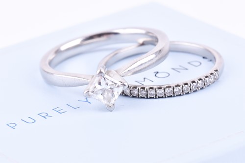 Lot 463 - A platinum and diamond ring, set with a square...