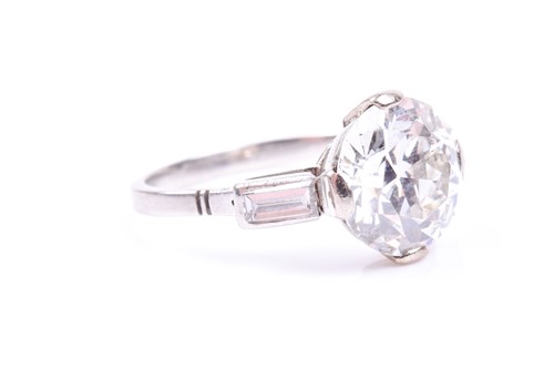 Lot 565 - An impressive round brilliant-cut solitaire...