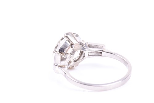 Lot 565 - An impressive round brilliant-cut solitaire...