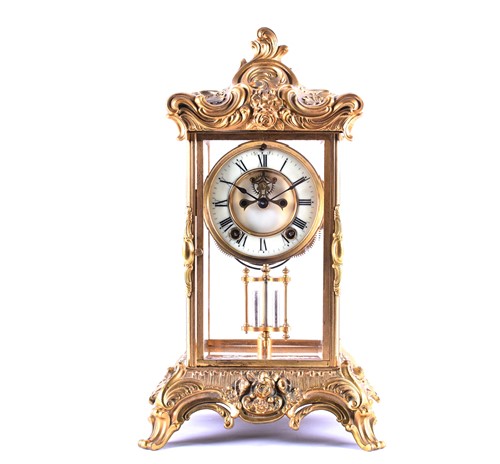 Lot 328 - An early 20th century gilt metal four glass...