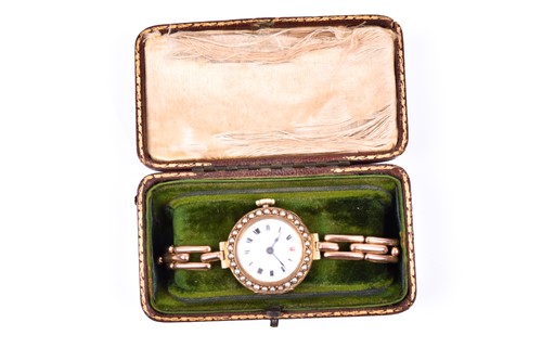 Lot 225 - An early 20th century yellow metal ladies...