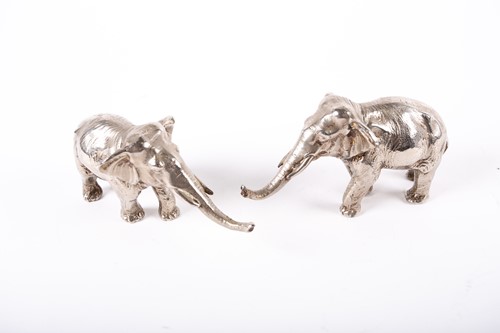 Lot 238 - A pair of Japanese silvered bronze elephants,...