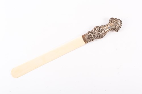 Lot 103 - A late Victorian silver and ivory page turner,...
