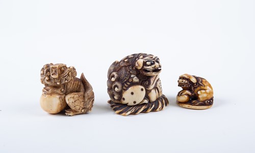 Lot 140 - Two Japanese ivory and a bone carving of...