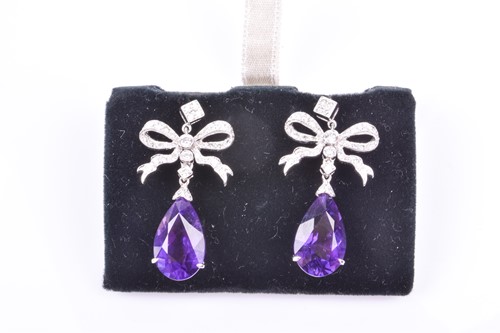 Lot 363 - A pair of 18ct white gold, diamond, and...