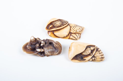 Lot 145 - Three Japanese ivory netsukes, 19th century,...