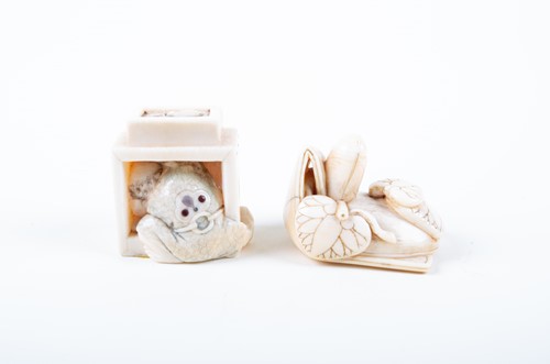 Lot 135 - Two Japanese ivory netsukes, Meiji, carved as...