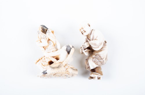 Lot 138 - Two Japanese ivory okimono, Meiji, carved as a...