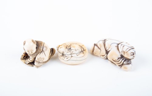 Lot 129 - Three Japanese ivory netsukes, Meiji period,...