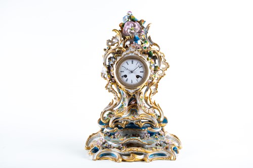 Lot 329 - A 19th-century French porcelain chiming mantle...