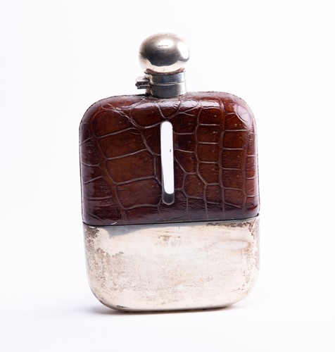 Lot 485 - A George V silver and crocodile effect skin...
